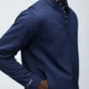 Die mit Fleece gefütterte Golfjacke Die mit Fleece gefütterte Golfjacke