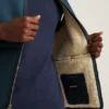 Die Weste mit Sherpa-Futter Die Weste mit Sherpa-Futter