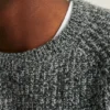Melierter Fischerpullover mit Rundhalsausschnitt Melierter Fischerpullover mit Rundhalsausschnitt