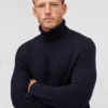 Merino-Rollkragenpullover mit Zopfmuster Merino-Rollkragenpullover mit Zopfmuster