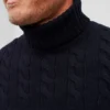 Merino-Rollkragenpullover mit Zopfmuster Merino-Rollkragenpullover mit Zopfmuster