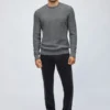 Pullover aus Baumwolle und Kaschmir mit Zopfmuster und Rundhalsausschnitt Pullover aus Baumwolle und Kaschmir mit Zopfmuster und Rundhalsausschnitt