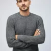 Pullover aus Baumwolle und Kaschmir mit Zopfmuster und Rundhalsausschnitt Pullover aus Baumwolle und Kaschmir mit Zopfmuster und Rundhalsausschnitt