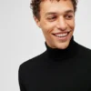 Waschbarer Rollkragenpullover aus Merinowolle Waschbarer Rollkragenpullover aus Merinowolle