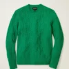 Wollpullover mit Rundhalsausschnitt und Zopfmuster Wollpullover mit Rundhalsausschnitt und Zopfmuster